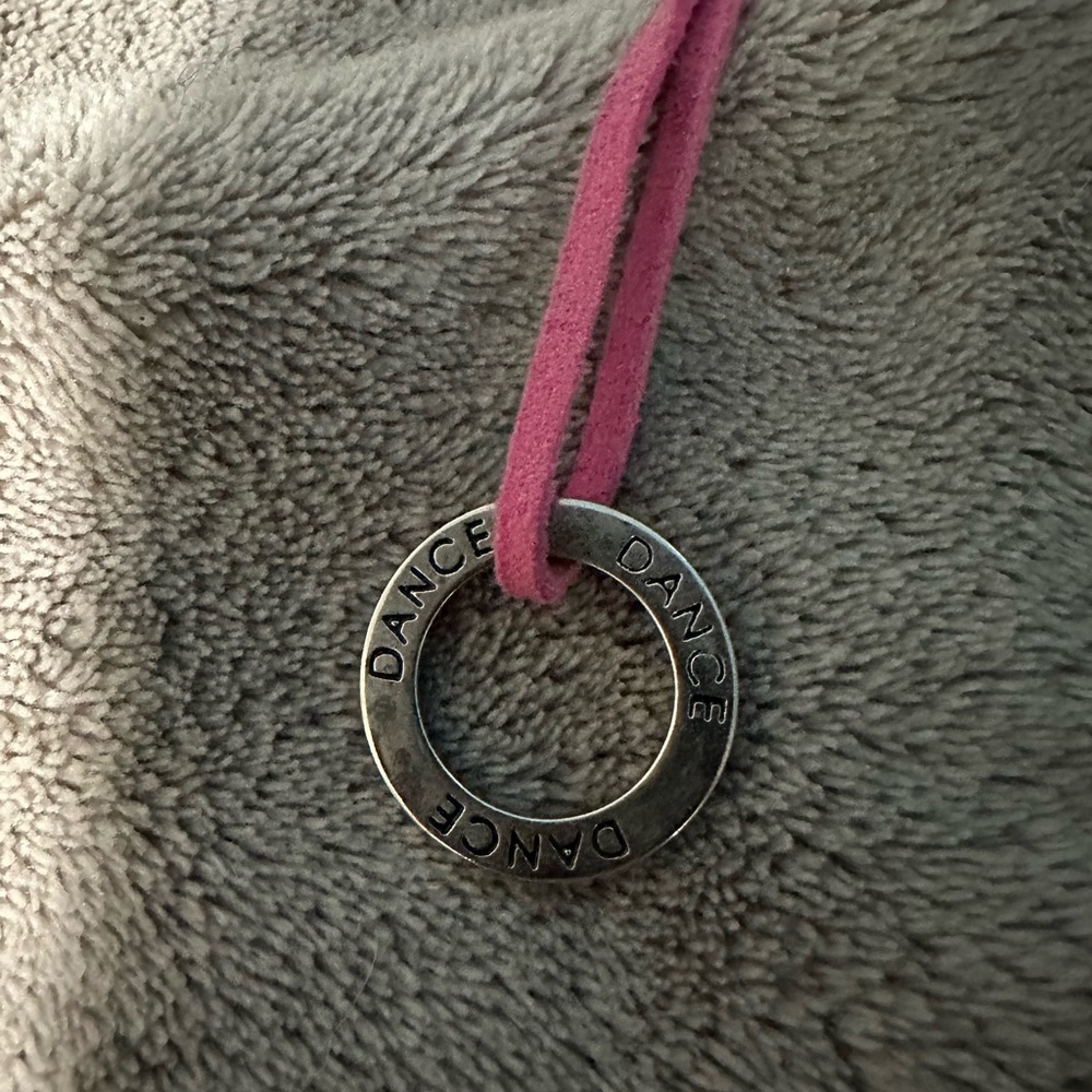 Silver Dance Pendant Necklace with Pink Cord